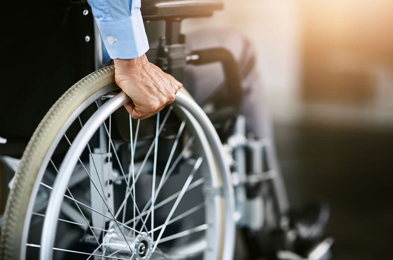 Disability Insurance Man in Wheel Chair Your Insurance Gal