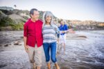 Senior couple walking on the beachMedicare what to now Your Insurance Gal